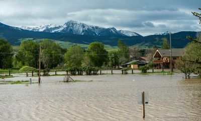 Yellowstone visitors ordered to leave as floodwaters leave wreckage behind