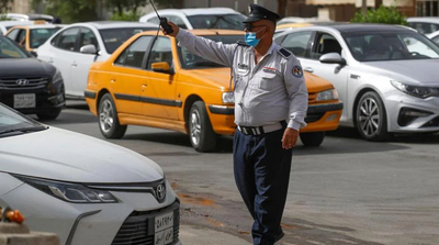 Life in the Slow Lane for Iraq's Gridlocked Traffic