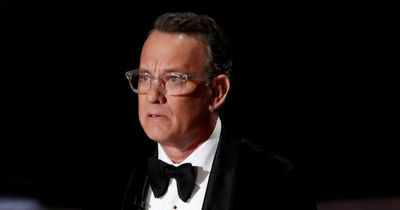 Tom Hanks fans fear for actor's health as he's unable to control shaking hand on stage