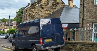Bafflement as double yellow lines painted around parked Ford Transit van