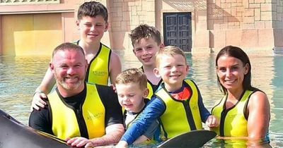 Wayne Rooney and family criticised for swimming with captive dolphins on Dubai break