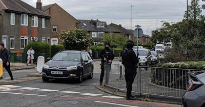 Armed police swarm on property during drug bust where £100,000 of heroin and cocaine recovered