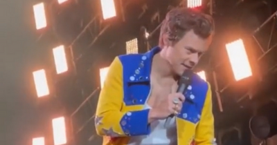 Harry Styles swallows fly at Glasgow gig while wishing fan happy birthday in hilarious clip