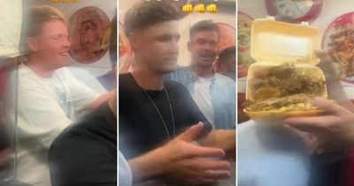 England celebrate famous win with huge takeaway as Ollie Pope looks lovingly at kebab