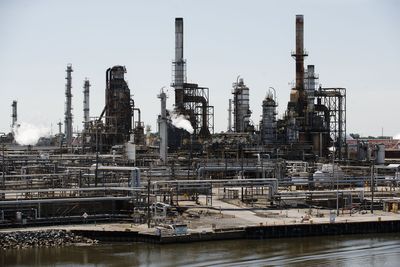 Biden calls on oil refiners to produce more, cut profit margins