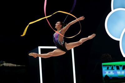 On your marks: Gymnast clears her highest bar
