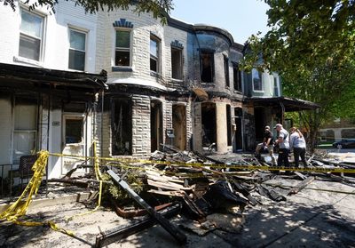 Fire rips through 4 Baltimore row homes, leaves 3 hurt