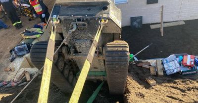 Man rescued after excavator pins him to retaining wall at Greta