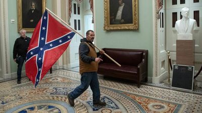 Confederate flag-wielding father and son found guilty for role in Capitol insurrection