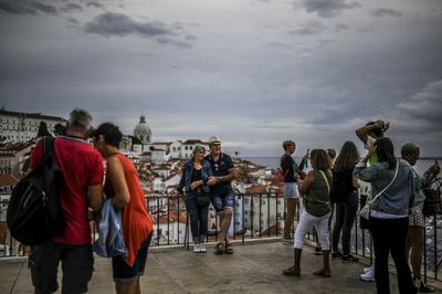 Portugal’s COVID deaths grow as tourism season kicks off