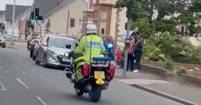 Edinburgh police motorcyclist filmed dancing on bike in side-splitting clip