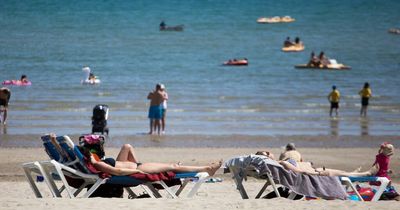 UK weather: Huge downpours to lash city after heatwave and 'Tropical Night'