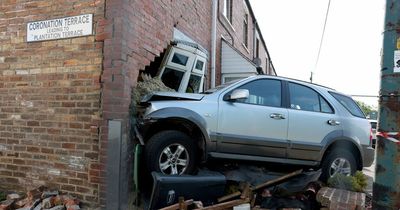 Two people taken to hospital after car smashes into front of County Durham home