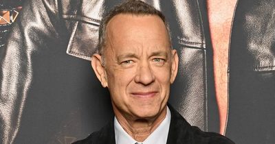 Furious Tom Hanks screams and swears at fans to 'back off' as wife Rita knocked over in mob