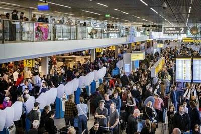 Schiphol Airport in Amsterdam ‘poised to cut number of flights over summer travel season ’