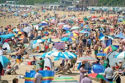 London weather and travel latest: UK records hottest day of the year again as temperature surges past 32C