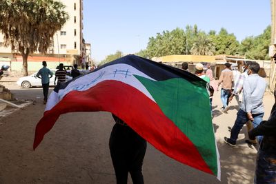 Sudan protester shot dead as protests flare following military-civilian meeting