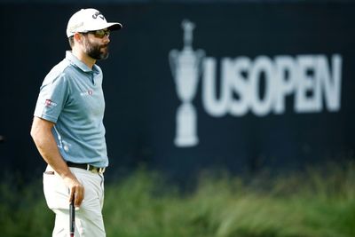 US Open resumes with Hadwin ahead, stormy scene for McIlroy