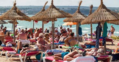 Brits banned from wearing swim shorts and football shirts in Majorca resorts