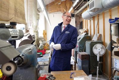 Edward helps put finishing touches to Commonwealth Games medals