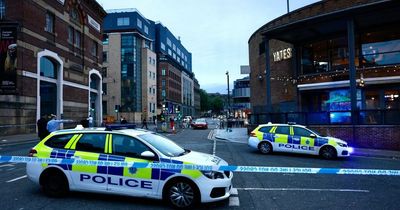 Two men stabbed after argument outside bar in city centre