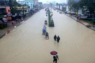 Devastating floods in India and Bangladesh kill at least 18 - millions of homes underwater