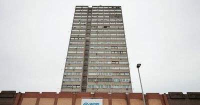 Three held on suspicion of murder after man found unconscious at tower block in "unexplained" death