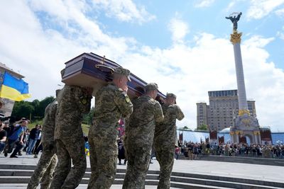 In Ukraine, funeral for activist killed and mourned in war