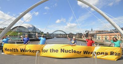 Health workers pull Millennium Bridge stunt in campaign against nuclear weapons