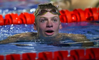 Marchand scorches to medley world title in pursuit of Phelps