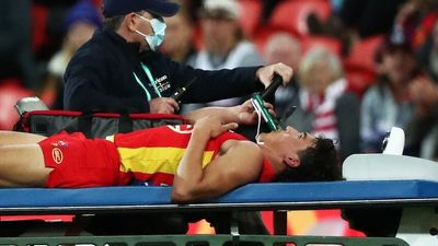 Gold Coast Suns beat Adelaide by 43 points as gruesome injury to Wil Powell mars crucial win