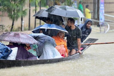 Dozens dead, millions stranded as floods hit Bangladesh, India