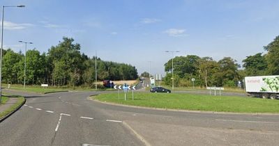 Woman arrested after early morning crash with parked vehicle on Scots roundabout