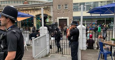 'Police guard as protesters blocked in pub by rival campaigners' amid emergency closure