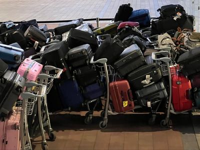 Heathrow airport: 15,000 passengers face cancelled flights on Monday amid baggage handling meltdown