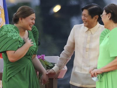 The daughter of the outgoing Philippine president takes oath as vice president