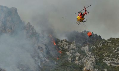 Weather tracker: easing of Europe heatwave may be only temporary reprieve