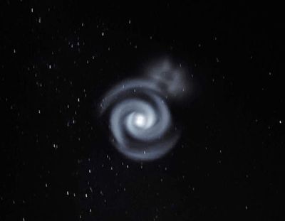 Mysterious spirals of blue light in sky stun New Zealand stargazers