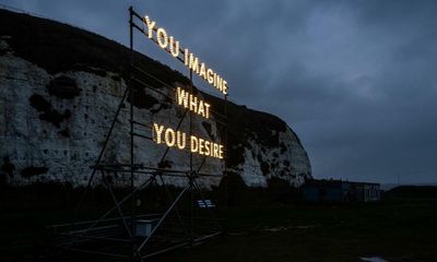 ‘I’m appalled’: The artist who put up a giant sign for refugees at sea to read