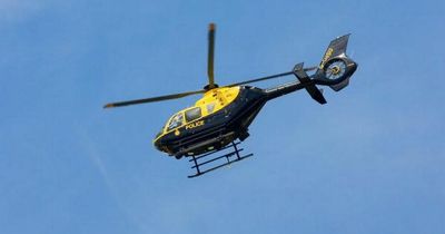 Helicopter crashes into field as police and paramedics rush to scene