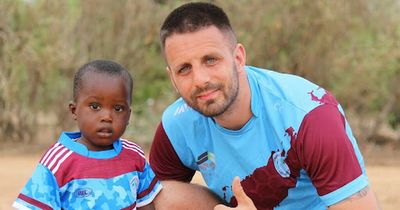 Co Tyrone football player on joy of Senegalese kids after presented with local club jerseys