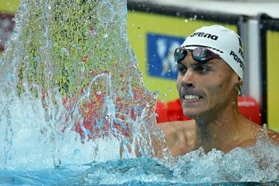 Romanian Popovici, 17, wins men's 200m freestyle world title