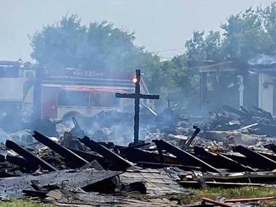 A lone cross was left standing after a Texas church burned to the ground