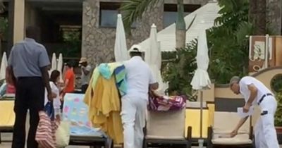 Sunbed-blockers have towels taken away by staff at five-star Tenerife resort