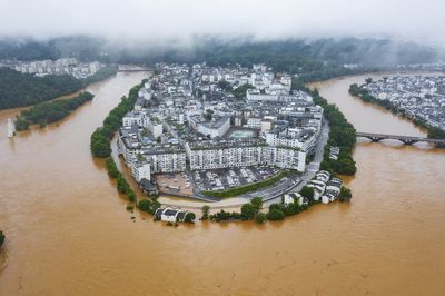 Hundreds of thousands evacuated in China amid heavy rains, floods