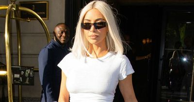 Kim Kardashian shows off tiny waist in skintight trousers after reduction rumours