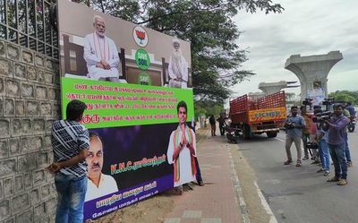 Police remove illegal flex boards on Avinashi Road in Coimbatore