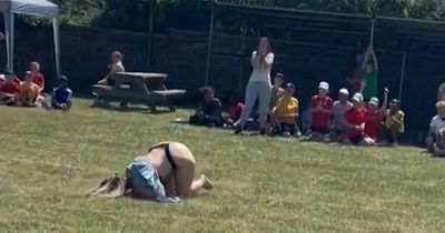 Mum faceplants on grass at school sports day and moons crowds of parents
