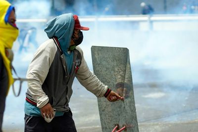 Ecuadorans teargassed at demos that military deems 'grave threat'
