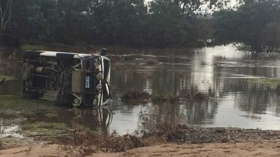 Tasmanian flooding inquest into deaths of Peter Watson and Trevor Foster begins with partner recalling last moments